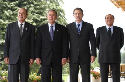 President George W. Bush poses with G8 leaders during the G8 Summit in Evian, France, Monday, June 2, 2003. From left, President Jacques Chirac of France, President Bush, Prime Minister Tony Blair of Great Britain and Prime Minister Silvio Berlusconi of Italy.