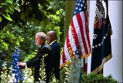 President George W. Bush and Secretary of Education Rod Paige discuss the progress of the No Child Left Behind Act in the Rose Garden Tuesday, June 10, 2003. "(The Act) requires every state in our country to submit an accountability plan that leads to measurable gains in student performance," said the President. "As of today, all of the states, plus Puerto Rico and the District of Columbia, have now submitted those plans." 