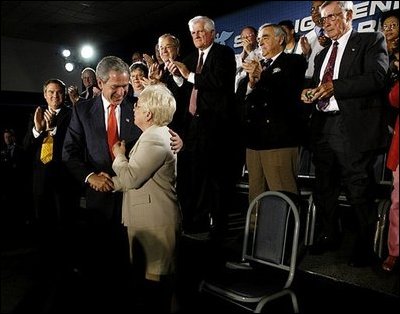 President George W. Bush greets Congresswoman Nancy Johnson after speaking to seniors about Medicare at New Britain General Hospital in New Britain, Conn., Thursday, June 12, 2003.