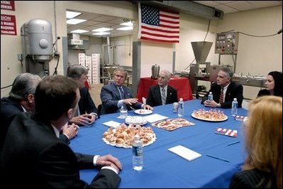 President George W. Bush speaks during a meeting with small business owners and employees at Andrea Foods in Orange, N.J., Monday, June 16, 2003. 