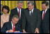 President George W. Bush signs the Trade Act of 2002 in the East Room Tuesday, Aug. 6. "With trade promotion authority, the trade agreements I negotiate will have an up-or-down vote in Congress, giving other countries the confidence to negotiate with us," said the President in his remarks.