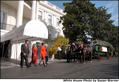 Mrs. Bush receives the official 2001 White House Christmas, an 18-foot Concolor fir that was grown in the mountains of Central Pennsylvania. The tree was presented to Mrs. Bush by Hill View Tree Farm of Middleburg and donated by the Bowersox family, who was named the 2000 National Grand Champion Grower by the National Christmas Tree Association. White House photo by Susan Sterner.