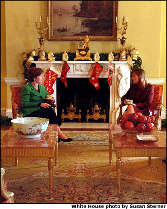 Mrs. Bush hosts a tea for the First Lady of Bolivia Virginia Gillum De Quiroga in the Yellow Oval Room inside the White House residence Dec. 6. White House photo by Susan Sterner.