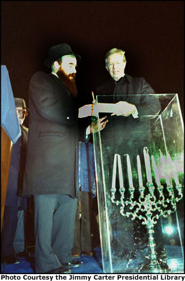 President Jimmy Carter lights a menorah in 1979 in Lafayette Park, across the street from the North Portico of the White House. Photo Courtesy the Jimmy Carter Presidential Library