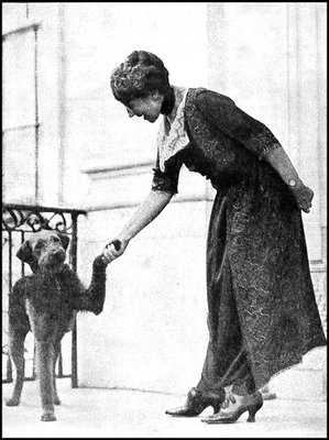 First Lady Florence Harding shakes hands with her dog, Laddie Boy. Warren Harding was president from 1921 to 1923. 