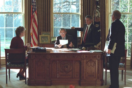 President Bush meets with his senior advisers in the Oval Office. White House photo by Paul Morse.