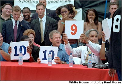 President Bush and Mayor Street help judge a contest at an urban block party in Philadelphia's downtown July 4, 2001. White House photo by Paul Morse