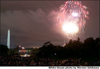 Although dark clouds rained on everybody's parade in Washington D. C., the sky opened up just in time for a firey spectacle set to patriotic music performed by the National Symphony Orchestra July 4, 2001. White House photo by Moreen Ishikawa