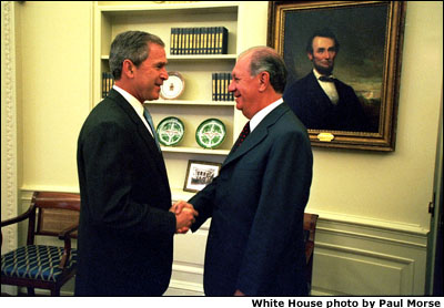 President Bush welcomes Chilean President Lagos to the Oval Office. White House photo by Paul Morse.