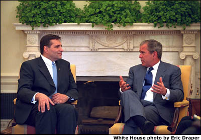 President Bush discusses issues with President Boris Trajkovski of Macedonia in the Oval Office. White House photo by Eric Draper