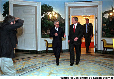 President Bush walks through the White House with Moshe Katzav, the President of Israel. White House photo by Susan Sterner