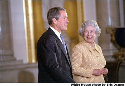 Her Majesty walks with the President through Buckingham Palace on July 19, 2001. White House photo by Eric Draper.