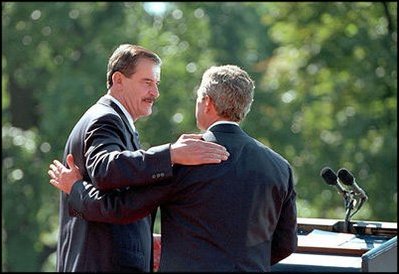 Presidents Bush and Fox embrace during the ceremonies. "This is a recognition that the United States has no more important relationship in the world than the one we have with Mexico," said President Bush. "Good neighbors work together and benefit from each other's successes."