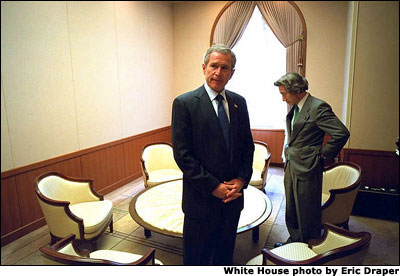 President George W. Bush and Japanese Prime Minister Junichiro Koizumi talk privately at Iikura House, a government conference center, in Tokyo, Monday, Feb. 18, 2002. White House photo by Eric Draper.
