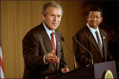 President George W. Bush and El Salvador's President Francisco Flores (right) hold a joint press conference in San Salvador, El Salvador, March 24, 2002. White House photo by Eric Draper