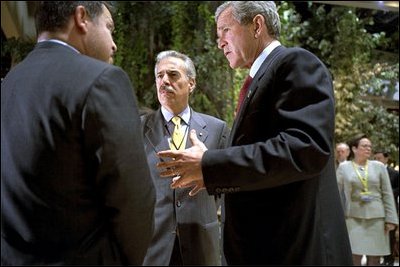 President George W. Bush talks with King Abdullah of Jordan (left) and President Pastrana of Colombia during the United Nations conference in Monterey, Mexico, March 22, 2002. White House photo by Eric Draper