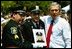 President George W. Bush stands for pictures during the Annual Peace Officers' Memorial Service at the U.S. Capitol in Washington, D.C., Saturday, May 15, 2004. 