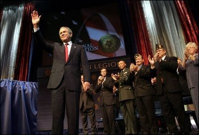 President George W. Bush addresses the 85th Annual American Legion Convention in St. Louis, Mo., Tuesday, Aug. 26, 2003. "In the 20th century, the American flag and the American uniform stood for something unique in history," President Bush said in his remarks. "America's armed forces humbled tyrants and raised up and befriended nations that once fought against us."