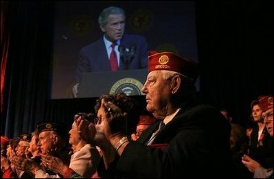 President George W. Bush addresses the 85th Annual American Legion Convention in St. Louis, Mo., Tuesday, Aug. 26, 2003. "In the 20th century, the American flag and the American uniform stood for something unique in history," President Bush said in his remarks. "America's armed forces humbled tyrants and raised up and befriended nations that once fought against us."