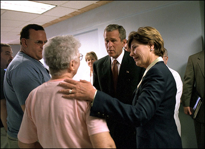 President Bush and Laura Bush comfort family members at Washington Hospital Center Sept. 13. The President and First Lady visited the hospital to thank doctors and visit patients wounded in the attack on the Pentagon.