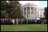 President George W. Bush and Vice President Dick Cheney are joined by White House staff members as they observe a moment of silence on the White House South Lawn Sept. 18. 