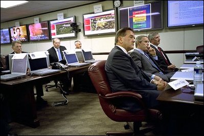 Accompanied by Governor Ridge and White House Chief of Staff Andrew Card, President Bush visits the Homeland Security Complex in Washington, D.C., Sept. 19, 2002. 