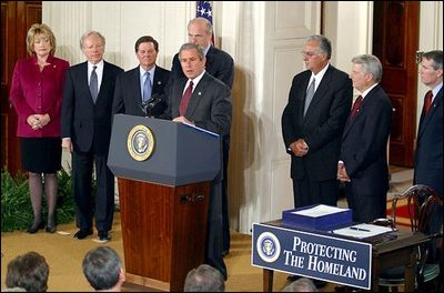 President Bush addresses the media during the signing of the Homeland Security Act of 2002 in the East Room Nov. 2, 2002. The largest reorganization of the federal government since World War II, the plan brings together 22 agencies, more than 170,000 federal employees, under one department.