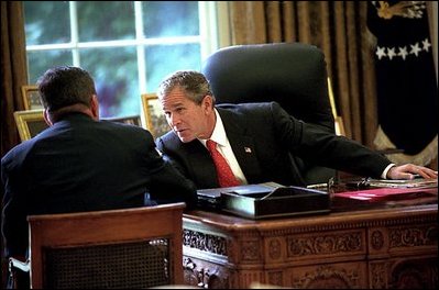 President George W. Bush and Governor Ridge meet alone in the Oval Office Oct. 23, 2001.