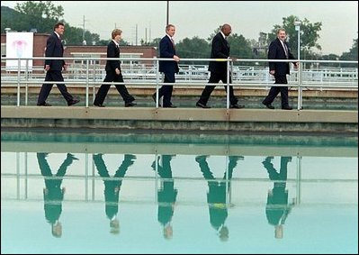 Traveling with President Bush, Governor Ridge tours a water treatment plant in Kansas City, Mo., with EPA Administrator Christie Todd Whitman, center left, and Education Secretary Rod Paige, center right, June 11, 2002.