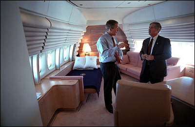 President George W. Bush confers with White House Chief of Staff Andy Card aboard Air Force One Sept. 11, 2001.