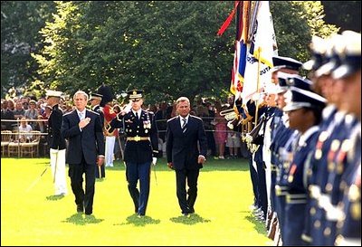 After the playing of the national anthems, President Bush and President Kwasniewski review the troops. "Today, Poland and America are forging a new strategic relationship, but the friendship between our people is very old," said President Bush in his remarks. "Over two centuries ago, when Americans were fighting for our independence, Poles fought alongside us." 