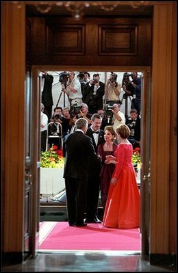 With cameras from the entire world watching, President George W. Bush and Mrs. Laura Bush greet Mexican President Vicente Fox and his wife Martha Sahagun de Fox to this administration's first State Dinner at the White House Sept. 5.