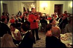 As White House staff and Cabinet members dine with invited guests, members of the Marine Band perform throughout the State Dining Room July 17. White House photo by Eric Draper.