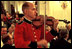 As White House staff and Cabinet members dine with invited guests, members of the Marine Band perform throughout the State Dining Room July 17. White House photo by Eric Draper.