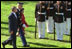 President Bush and President Arroyo review the troops.