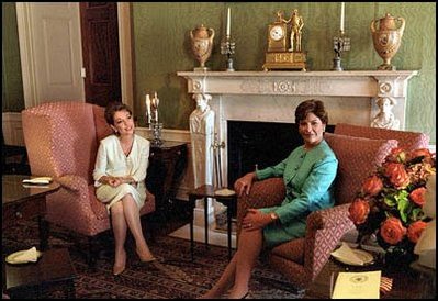 After decorating it with green silks, John Quincy Adams named the room that was traditionally used for small teas and receptions as, "the Green Drawing Room." More than 150 years later, Mrs. Laura Bush holds to the oldest of traditions as she hosts a tea in the Green Room for Mexico's visiting First Lady Martha Sahagun de Fox.