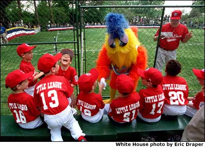 The San Diego Chicken visits the Rockies dugout before the game begins. White House photo by Eric Draper.