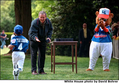 President Bush gave each player a memento of the afternoon. White House photo by David Bohrer.