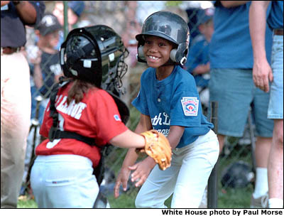 The little leaguers were so eager that even getting tagged out was fun. White House photo by Paul Morse.