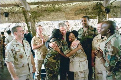 President George W. Bush greets military personnel at MacDill Air Force Base in Tampa, Fla., June 16, 2004.