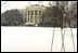 A blanket of snow covers the South Lawn of the White House, Thursday, Dec. 5, 2002. 