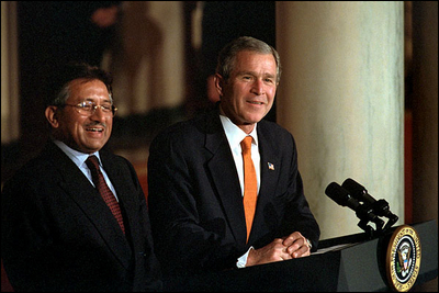 President Bush and Pakistani President Pervez Musharraf address the media in the Cross Hall, Feb. 13. "The forces of history have accelerated the growth of friendship between the United States and Pakistan," said President Bush.