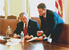 President Bush recording the weekly radio address to the nation.