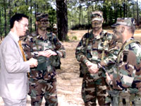Under Secretary of Defense for Personnel & Readiness David Chu meets with soldiers.