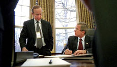 President Bush meets with OMB Director Mitch Daniels in the Oval Office