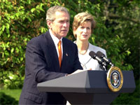 President Bush and Christie Todd Whitman, Administrator of the Environmental Protection Agency.