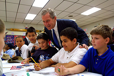 President Bush visits the B.W. Tinker School in Waterbury, Conn., July 18, 2001. A few months later President Bush signed the No Child Left Behind Act into law.