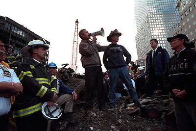 Standing on the ashes of the World Trade Center in New York on September 14, President Bush pledges that the voices calling for justice will be heard.
