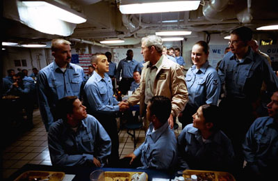 President George W. Bush meets crew members of the USS Abraham Lincoln May 1, 2003.
