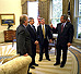 President Bush meets with White House senior staff members (from left) Karl Rove, Josh Bolten and Andy Card in the Oval Office June 10, 2002. 